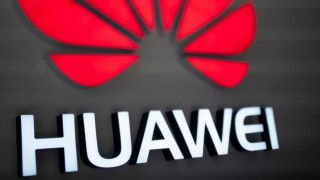 Huawei: China accuses UK of 'pride and prejudice'