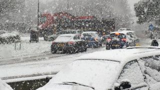 UK weather: Travel warnings after night of snowfall