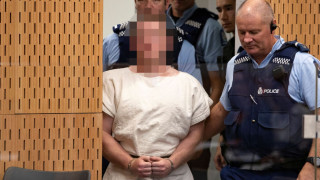 Man charged with mosque murders in Christchurch had white supremacist symbols on guns