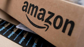 Amazon makes $1bn a month as growth slows